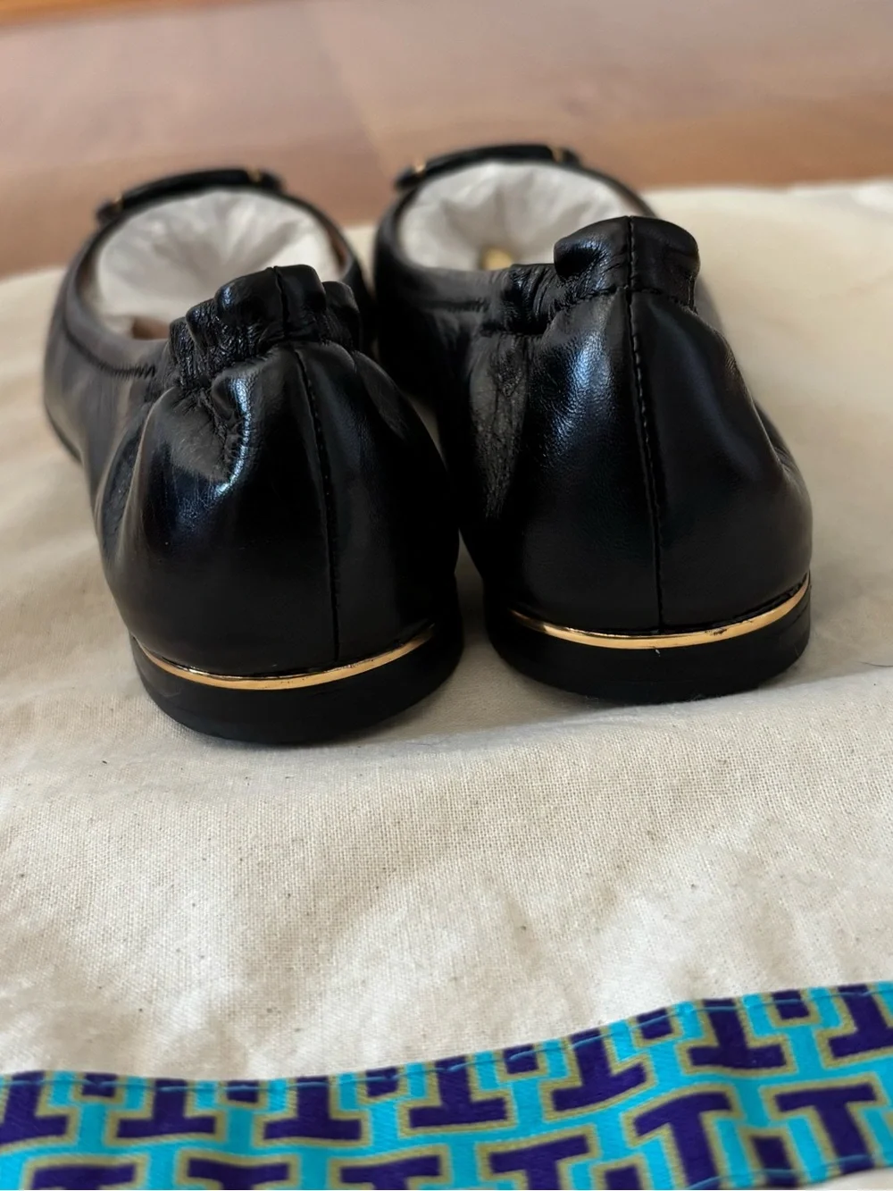 Brand New Tory Burch Black Leather Ballet Flats with Gold Medallion-Never worn